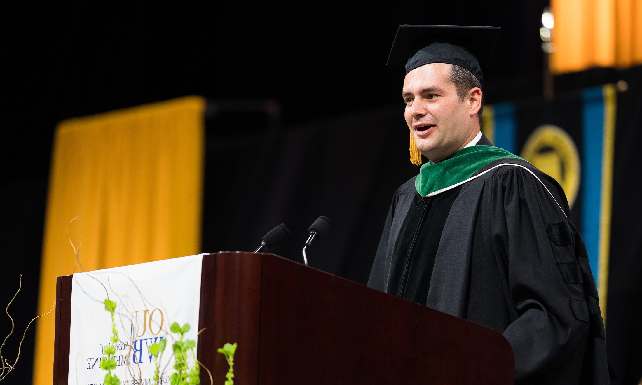 An image of Chris Jaeger, M.D., speaking at OUWB's 2022 commencement