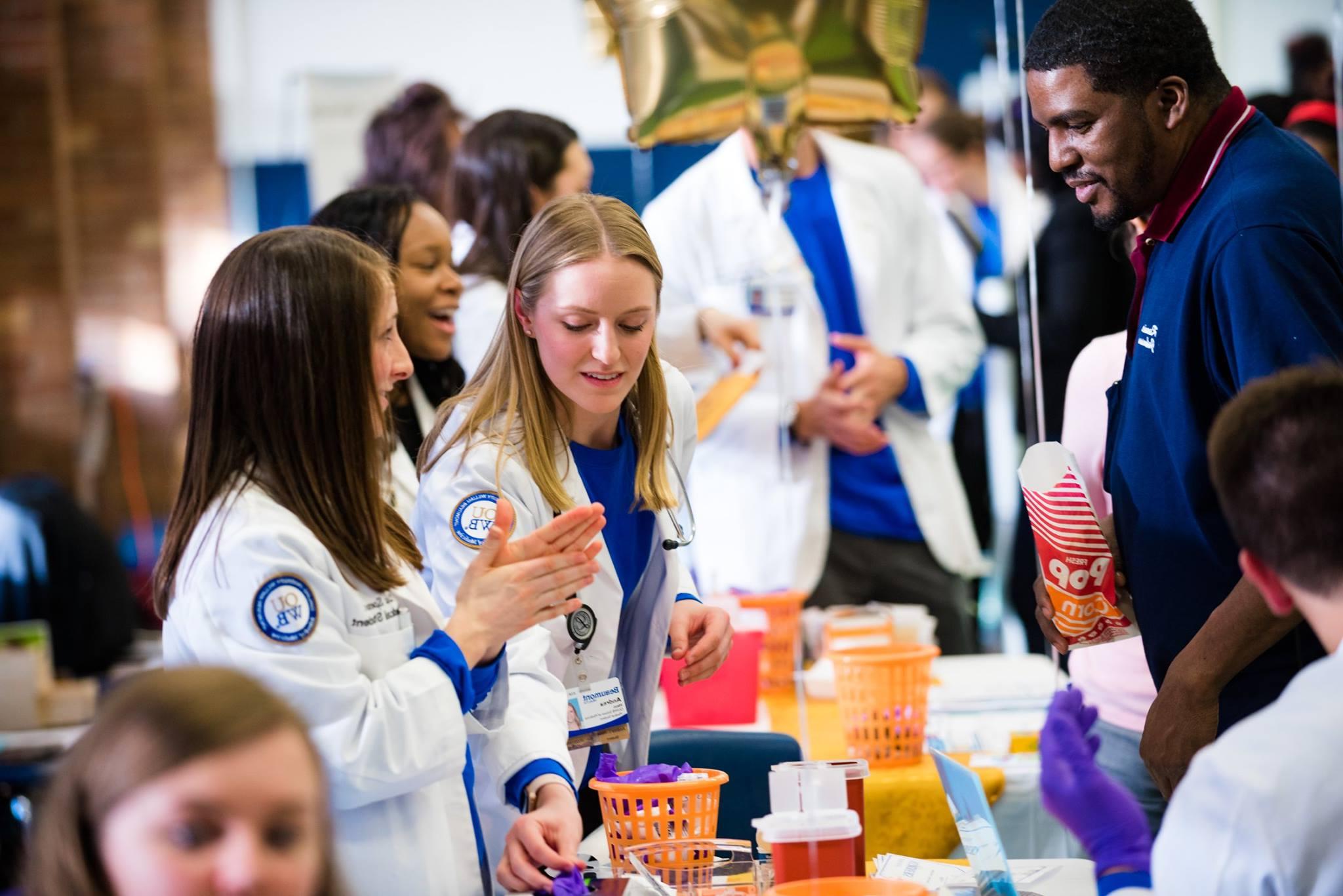 OUWB students work at the health fair 